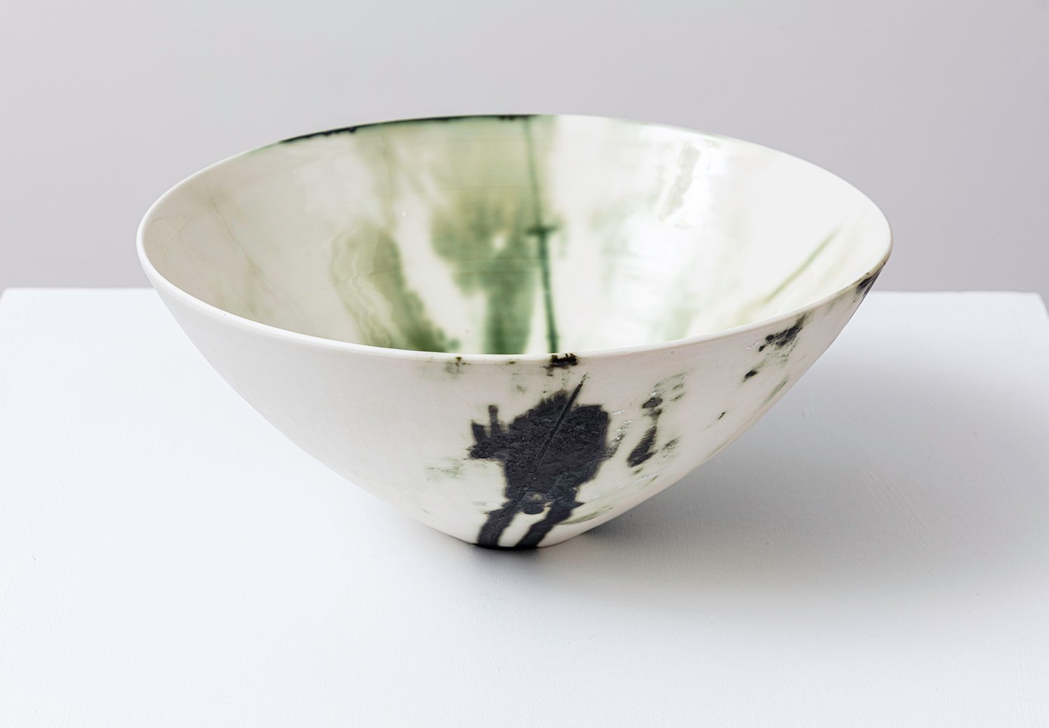 2 Zoe Andrews_Pomegranate bowl V_Copper oxide on porcelain with transparent glaze