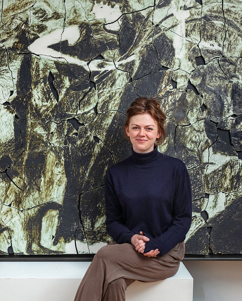 Zoë Andrews in front of her work, 'Return'