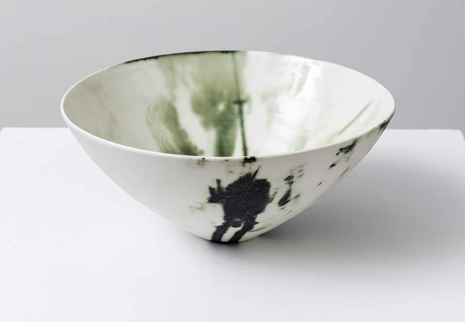 Zoë Andrews_Pomegranate bowl V_Copper oxide on porcelain with transparent glaze